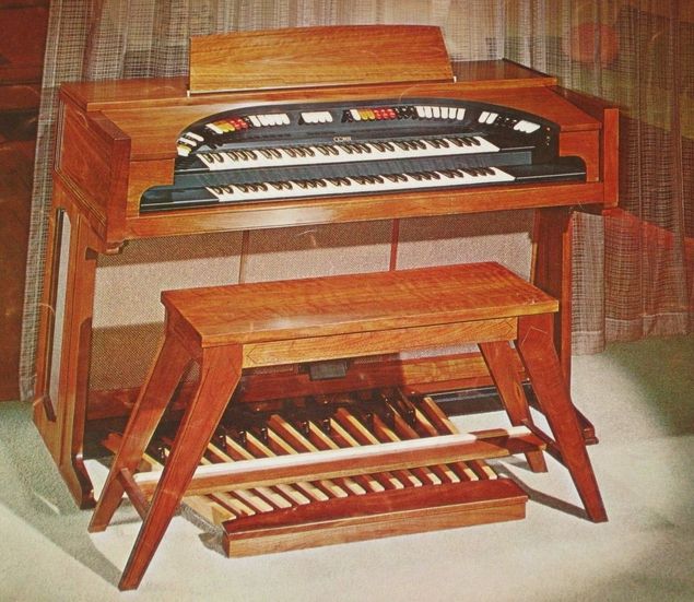 (con't from Part I)
It may happen that the novice organist's taste may turn to playing theatre organ arrangements, to where certain voices only available on this type of instrument are needed.
Back in the 1960's the Conn company manufactured a very fine analog theatre organ in the model 640 (photo), which, in addition to self-contained loudspeakers, was equipped with a built-in 2 speed Leslie speaker through which the tibias and vox humana were wired to speak.
This instrument, while it still had a 25-note flat, radiating pedalboard, had 2 full size manuals and 60 watts of power.
Being a vacuum tube oscillator organ like the Rhapsody model [See blog, Step Up Instruments, Part I], it had a full sound that was very solid.
Later models of this instrument were transistor oscillator organs, which sounded more tight and up front.
Both types had their individual merits however, and were very reliable.
The Solo manual was supplied with sub and super couplers which gave full block chords a big, powerful sound. 
This was the second step up instrument that one classically trained organist used to continue his journey in organ playing.
(con't in Part III)