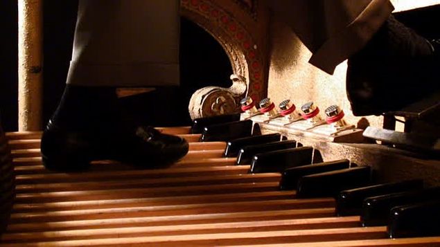 (con't from Part III)
When performing Romantic and post-Romantic compositions it very often happens that a rise or fall of volume is specified in the score which demands that the right foot be occupied with the swell shoe (photo); sometimes also the composer may specify the rapid and sequential addition or subtraction of stops and couplers at the same time while both hands, thumbs, and left foot are occupied, which will require either a console assistant or, more commonly, use of the crescendo shoe by the right foot.
If a phrase in the pedal ordinarily played by both feet (to keep connected the notes inside the slur) is written into such a passage, then the performer is faced with deciding whether to play that phrase using the right foot and temporarily ignore the dynamic indications -- OR -- to play the phrase entirely with the left foot so the right foot may remain planted on the swell shoe.
Here the performer may have to arrive at a compromise which tries to preserve the best of both worlds, i.e. to provide dynamic nuance while at the same time keeping the pedal line intact without audible breaks.
This will require a very flexible left ankle to negotiate the numerous substitutions of left toe for left heel on the same white key and leaps of 3rds, 4ths, and even 5ths the performer is likely to encounter in playing such phrases, as written.
It may also require changing the manuscript mentally [See blog, Listening For The Listener] -- by either eliminating short rests written into the pedal line between adjacent notes in the score, thus connecting these notes ... or perhaps by inserting little breaks between awkward melodic intervals, at the ends of slurs, or even under slurs ... in order to get the notes in the left hand part more clear, or to free the left foot to move more smoothly and to free the right foot to remain on the swell or crescendo shoe, thus achieving greater control and making possible a more seamless crescendo or diminuendo.
While flexible ankles are needful to an organist, we should never ever, repeat NEVER, practice or over-practice any exercise if it leads to pain or stiffness; everyone's ankles, just like their hands, have limits to what they can do, it's different for different individuals, and, once we begin to feel a little fatigue, we should never push beyond that.
If however, through gradual methodical training, we should become adept at working our left foot this way, we will have done something that few organists have ever done -- we will have gotten beyond the mechanics of working the machine and have developed one of the most important faculties involved in reaching the hearts of our listeners.
The way one develops this facility is by taking a composition that has these elements in it and experimenting with it, marking the heel and toe pedal indications in the score, practicing it that way, using our ear, and learning from the results; J. Stuart Archer's familiar arrangement of Londonderry Air is an example of a composition, among many others, which could be used for this purpose [See menu bar, Videos, Londonderry Air subpage].
For improving the general flexibility of the ankles there are many self-help books available [See blog, Exercises, Part II], and they're all good; the pedal exercises in the Nilson book were recommended by this author's teachers.